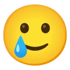 Emoji Cara sonriente con lágrima en Google